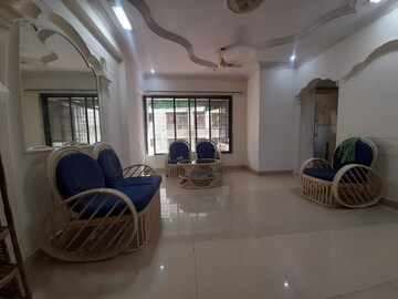 Living Room in 2 BHK Apartment at Nav Jyotirling CHS, Malad East – for Rent