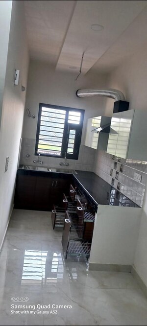 Kitchen in 3 BHK Apartment at Guru Nanak Enclave, Dhakoli – for Sale