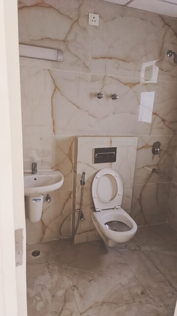 Bathroom in 3 BHK Apartment at Rishita Manhattan, Gomti Nagar – for Rent