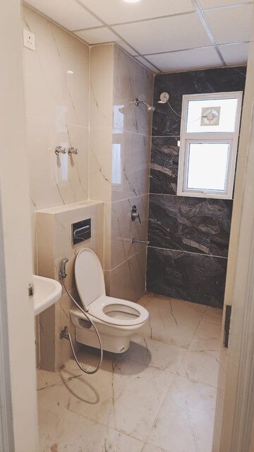 Bathroom in 3 BHK Apartment at Rishita Manhattan, Gomti Nagar – for Rent