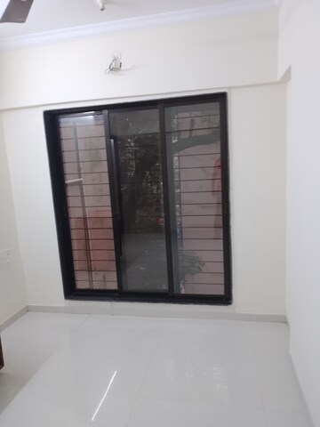 Room in 2 BHK Apartment at Namo Shanti Dham CHS, Borivali West – for Rent