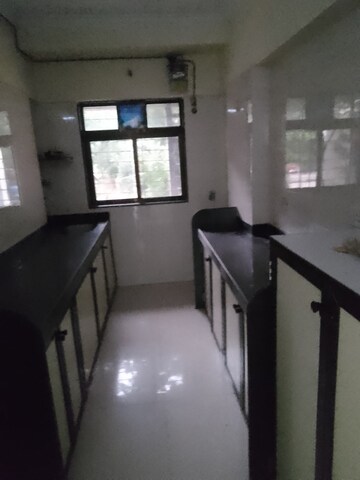 Kitchen in 2 BHK Apartment at Namo Shanti Dham CHS, Borivali West – for Rent