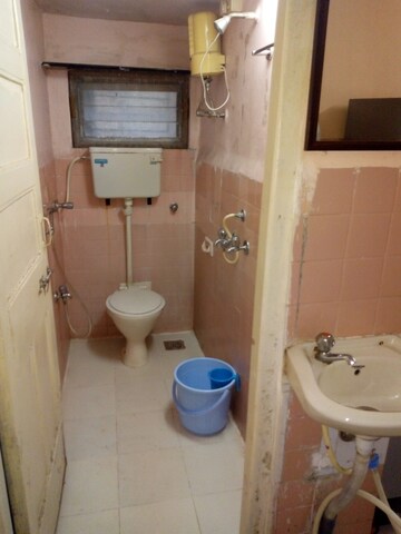 Bathroom in 1 BHK Apartment at Zalawad Darshan CHS, Andheri West – for Rent