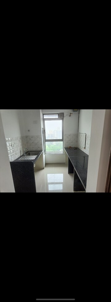 Kitchen in 2 BHK Apartment at Kalpataru Immensa, Kolshet Road – for Rent