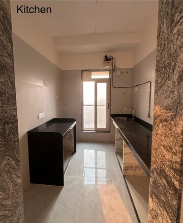 Kitchen in 3 BHK Apartment at Serenity Heights, Malad West – for Rent