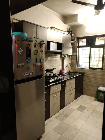 Kitchen in 2 BHK Apartment at Sahayog Complex, Manpada – for Rent