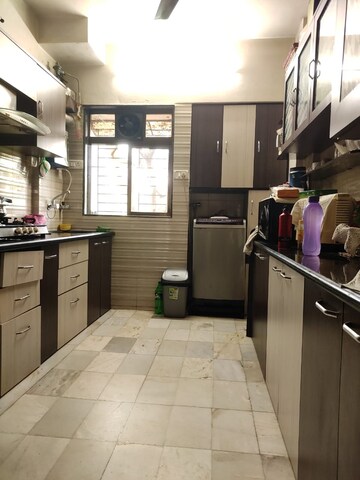 Kitchen in 2 BHK Apartment at Sahayog Complex, Manpada – for Rent