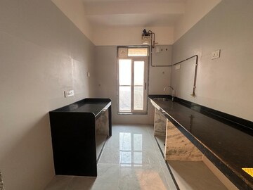 Kitchen in 3 BHK Apartment at Serenity Heights, Malad West – for Rent