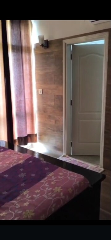 Bedroom in 2 BHK Apartment at Raheja Vedaanta, Sector 108 – for Rent
