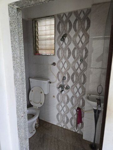 Bathroom in 1 BHK Apartment at Siddhitech Siddhi City, Badlapur East – for Rent