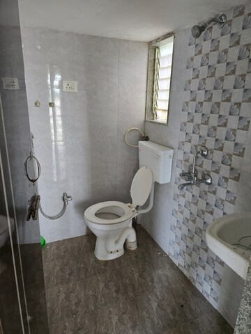 Bathroom in 1 BHK Apartment at Siddhitech Siddhi City, Badlapur East – for Rent