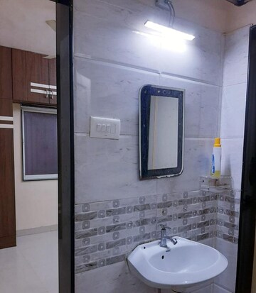 Bathroom in 1 BHK Apartment at Kudale Patil Township, Vadgaon Budruk – for Rent
