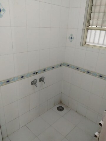 Bathroom in 2 BHK Apartment at Kudale Patil Township, Vadgaon Budruk – for Rent