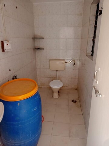Bathroom in 1 BHK Apartment at Kudale Patil Township, Vadgaon Budruk – for Rent