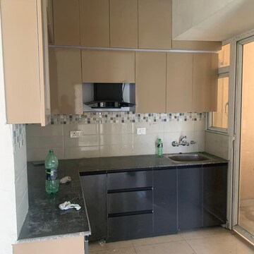 Kitchen in 2 BHK Apartment at Signature Orchard Avenue 2, Hayatpur – for Rent