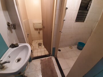 Bathroom in 1 BHK Apartment at Kudale Patil Township, Vadgaon Budruk – for Rent