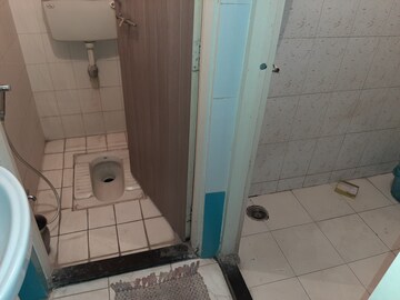 Bathroom in 1 BHK Apartment at Kudale Patil Township, Vadgaon Budruk – for Rent