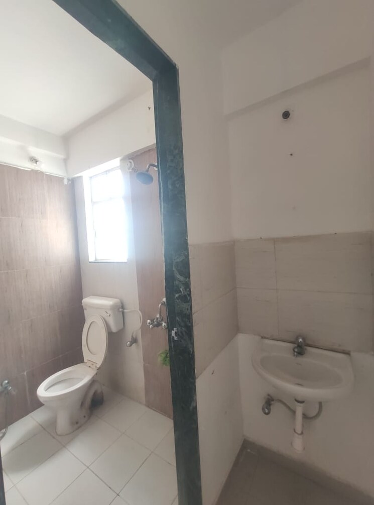 Bathroom, essen-shonest-towers 2 Bedroom 630 Sq.Ft. Apartment In Wakad Pune 9134796