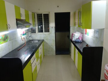 Kitchen in 2 BHK Apartment at Soba Optima, Sinhagad Road – for Rent