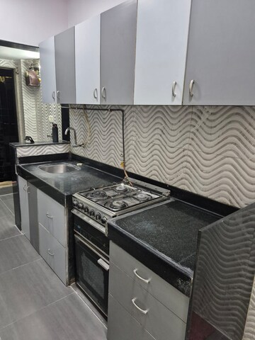 Kitchen in 1 BHK Apartment at Kalpataru Shravasti, Malad West – for Rent