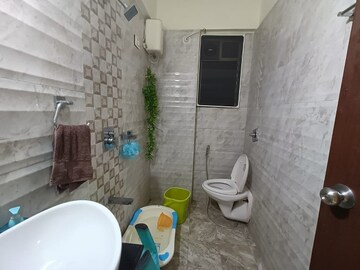 Master Bedroom in 2 BHK Apartment at Bhoomi Acres, Waghbil – for Sale