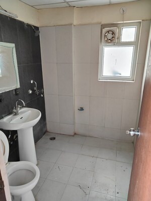 Bathroom in 3 BHK Apartment at Amrapali Golf Homes, Sector 4 Greater Noida – for Sale