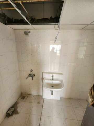 Bathroom in 2 BHK Apartment at Ahad Serenity, Rayasandra – for Sale