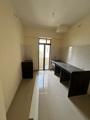 Building Lobby in 2 BHK Apartment at Vijay Garden, Ghodbunder Road – for Sale