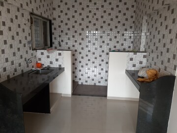 Kitchen in 2 BHK Apartment at Bandal Sudatta Sankul, Sinhagad – for Rent