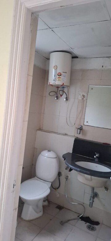 Bathroom in 3 BHK Apartment at Orchid Petals, Sector 49 – for Rent