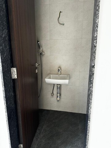 Bathroom in 1 BHK Apartment at Lalani Valentine Apartment, Malad East – for Rent