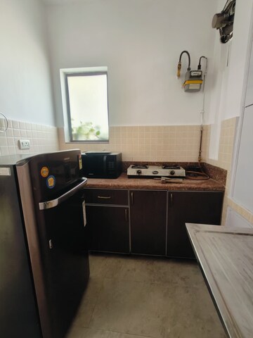 Kitchen in 1 BHK Apartment at Boutique Residential Apartments C-220, Malviya Nagar – for Rent