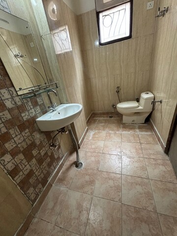 Bathroom in 1 BHK Builder Floor at VRK Premium Housing Society, Vasundhara Sector 1 – for Rent