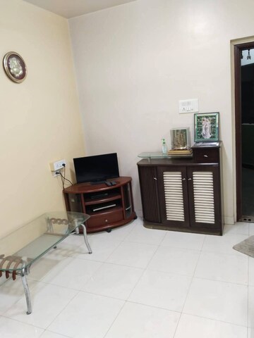 Living Room in 1 BHK Apartment at Silver Woods Wakad, Wakad – for Rent