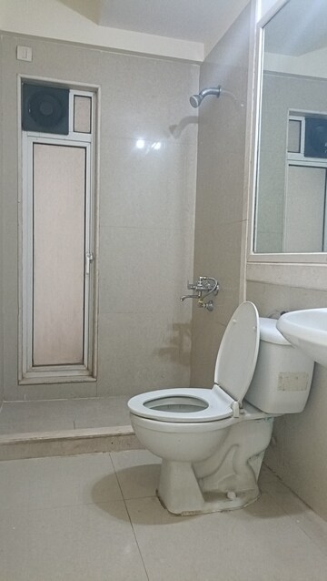 Bathroom in 1 BHK Apartment at Hiranandani Estate Crown, Ghodbunder Road – for Rent
