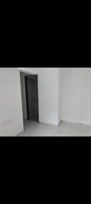 Master Bedroom in 1 BHK Apartment at Runwal My City Phase II Cluster 05, Dombivli East – for Rent