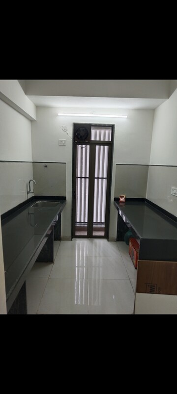 Kitchen in 1 BHK Apartment at Runwal My City Phase II Cluster 05, Dombivli East – for Rent