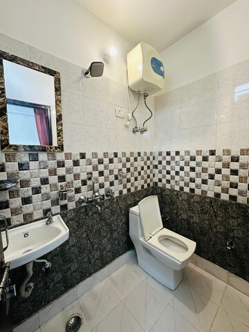 Bathroom in 3 BHK Apartment at Shree Ram Apartment 4, Wazirabad – for Rent