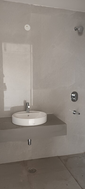 Bathroom in 4 BHK Apartment at Ramprastha Greens – for Sale