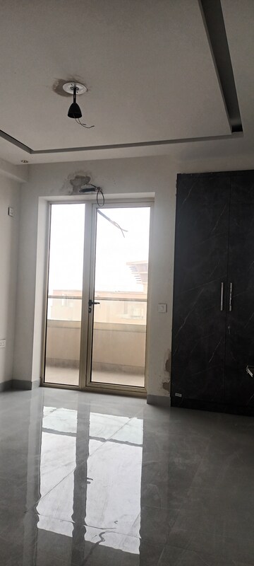 Bedroom in 4 BHK Apartment at Ramprastha Greens – for Sale