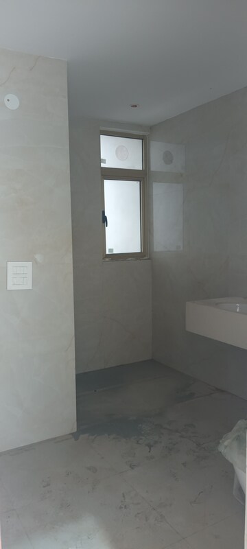 Bathroom in 4 BHK Apartment at Ramprastha Greens – for Sale