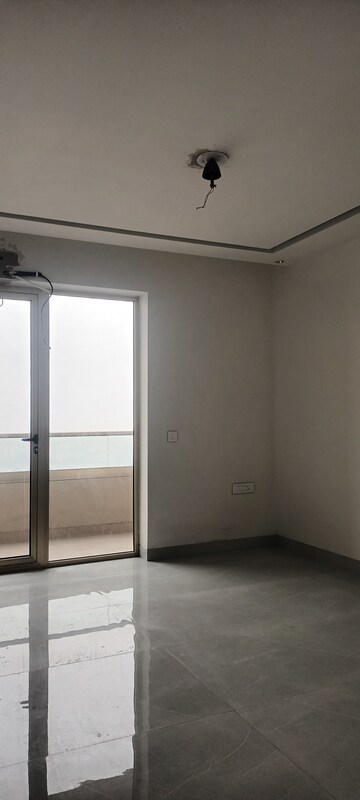 Bedroom in 4 BHK Apartment at Ramprastha Greens – for Sale