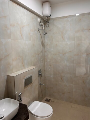 Bathroom in 1 BHK Apartment at Lokhandwala Whispering Palms, Kandivali East – for Rent