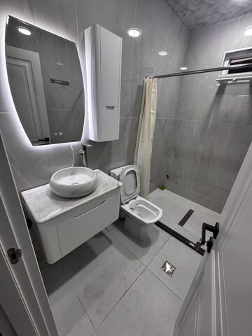 Bathroom in 4 BHK Builder Floor at Bawadia Kalan – for Sale