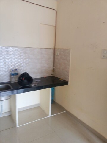 Team Area in 1 BHK Apartment at Ganoomal Mansion CHS, Wadala West – for Rent