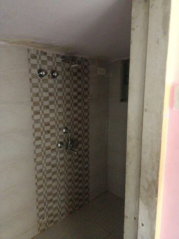 Bathroom in 1 BHK Apartment at Ganoomal Mansion CHS, Wadala West – for Rent