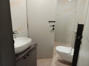 Bathroom in 4 BHK Apartment at Adarsh Nagar – for Sale