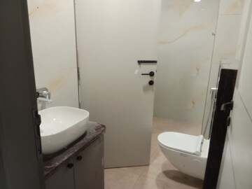 Bathroom in 4 BHK Apartment at Adarsh Nagar – for Sale