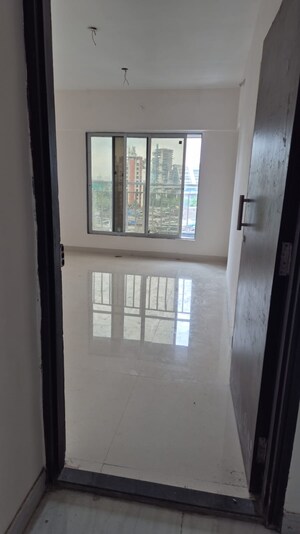 Room in 1 BHK Apartment at Satellite Garden, Goregaon East – for Sale