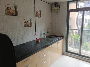 Kitchen in 1 BHK Apartment at Satellite Garden, Goregaon East – for Sale
